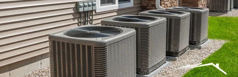 Professional HVAC technicians performing system maintenance